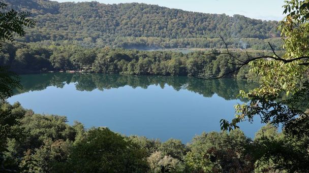 Monticchio, Basilicata, Italy - October 1, 2020: Panorama of the lakes from the Abbey of San Michele Arcangelo - Photo, Image