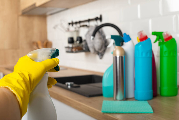 Colorful cleaning products in the kitchen - Photo, image