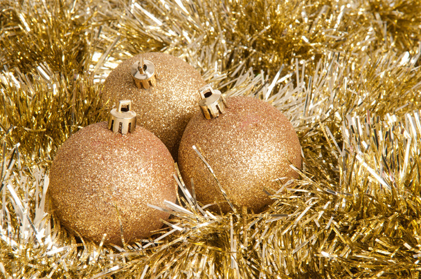 tři zlaté vánoční ozdoby - Fotografie, Obrázek