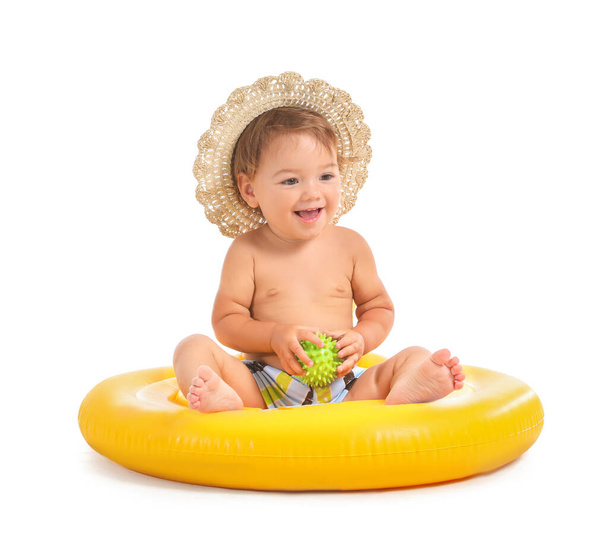 Cute baby boy with inflatable ring on white background - Foto, afbeelding