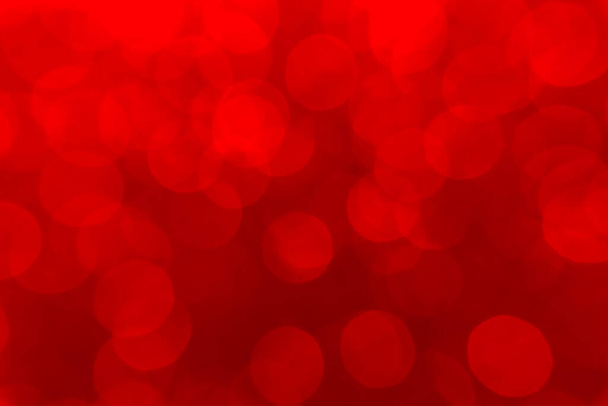 Hot defocused red lights for Valentine's day background. Red bokeh and red background. - 写真・画像