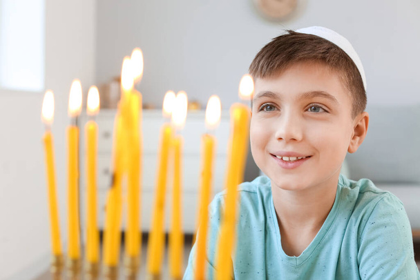 Happy boy celebrating Hannukah at home - Photo, Image