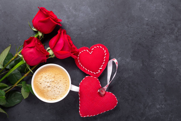 Valentines day greeting card. Coffee cup, red roses and textile hearts on stone background. Top view - Image - 写真・画像