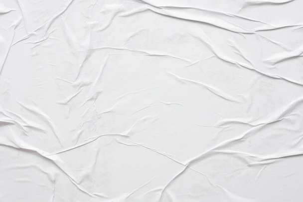 Blank white crumpled and creased paper poster texture background - Valokuva, kuva