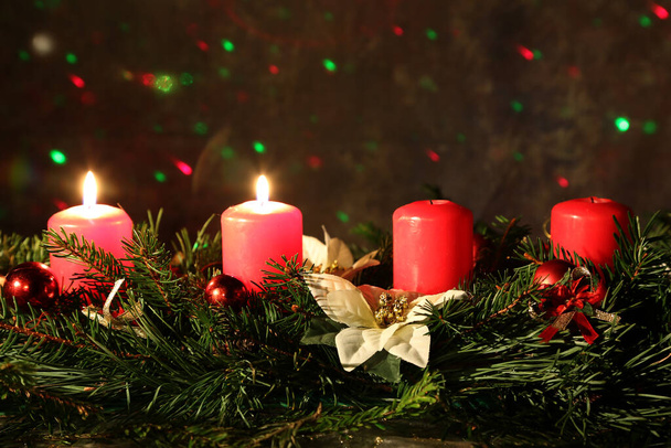 A selective shot of Christmas candles and spruce needles - Fotoğraf, Görsel