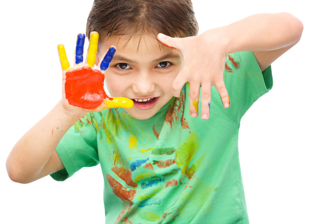 Portrait of a cute boy playing with paints - Foto, Imagem