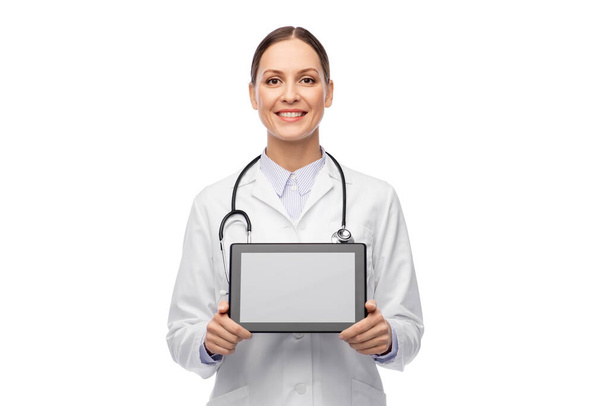 happy female doctor with tablet pc and stethoscope - Valokuva, kuva