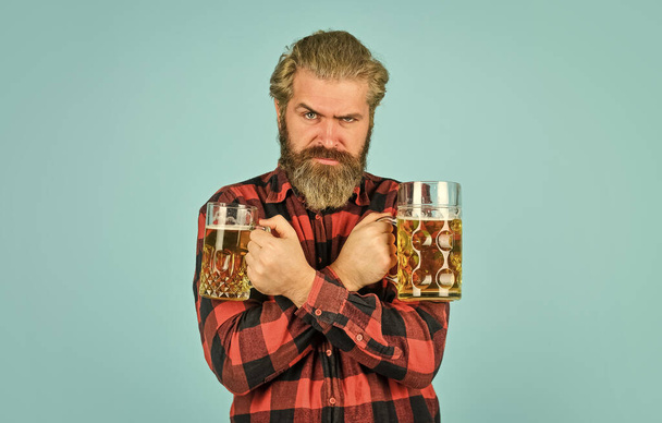 Alcoholic. Thirsty man drinking beer in pub bar. Hipster drink beer. Mature bearded guy hold beer glass. Cheers toast. True sensation. Holiday celebration. Bachelor day. Improve mood. Get drunk - Fotó, kép