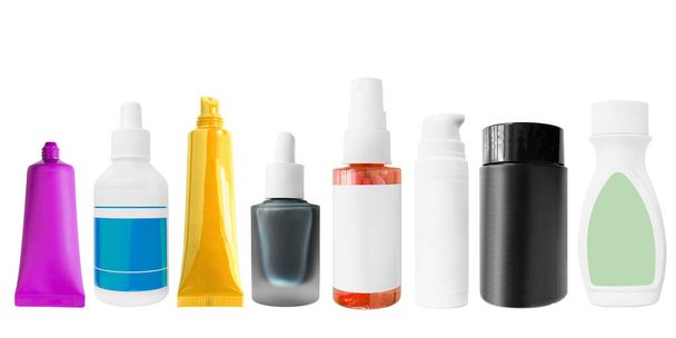 Collection of colorful blank cosmetics jars on white background - Foto, afbeelding