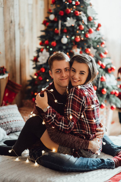 a guy and a girl celebrate the new year togethe - Valokuva, kuva