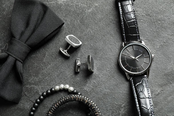 Flat lay composition with luxury wrist watch on black background - Zdjęcie, obraz