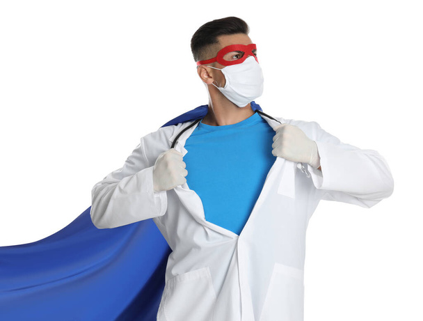 Doctor wearing face mask and cape on white background. Super hero power for medicine - Fotoğraf, Görsel