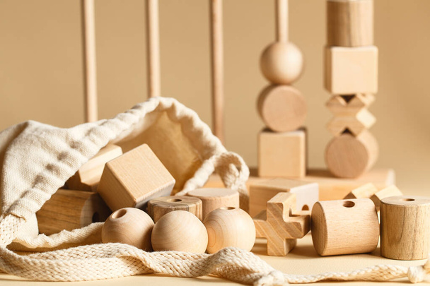 Children's wooden toys. Sequencing Blocks learning resource for educating shapes, fine motor skills, hand eye coordination, mathematical skills. Natural wood construction set. Educational equipment - Photo, Image