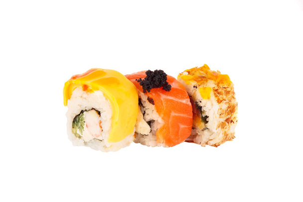 Japanese food: Set of salmon sushi and rolls with a seafood, isolated - Foto, Imagem