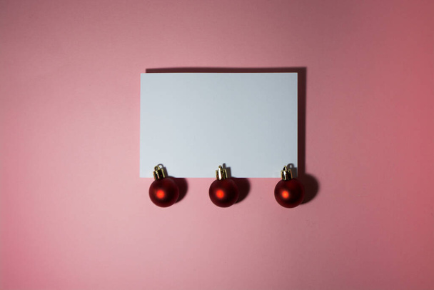 Christmas greeting card or photo frame over red background. - 写真・画像