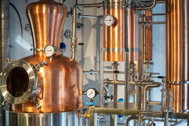 Copper vacuum still for distillation performed under reduced pressure for gin production - Photo, Image