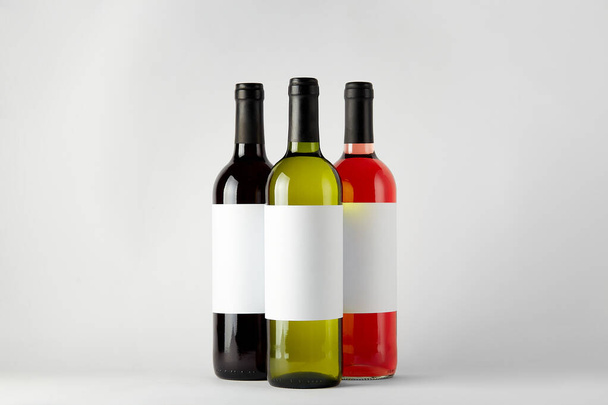 Mockup. Bottles of wine of different types isolated on a white background. - Foto, Imagem