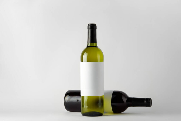 Mockup. Bottles of wine of different types isolated on a white background. - Foto, imagen