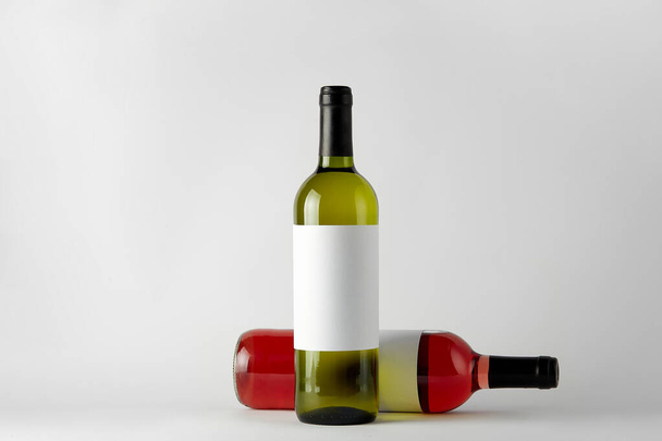 Mockup. Bottles of wine of different types isolated on a white background. - Foto, Bild