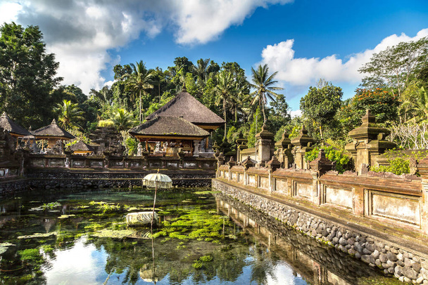 Pool holy water in Pura Tirta Empul Temple on Bali, Indonesia - Fotó, kép