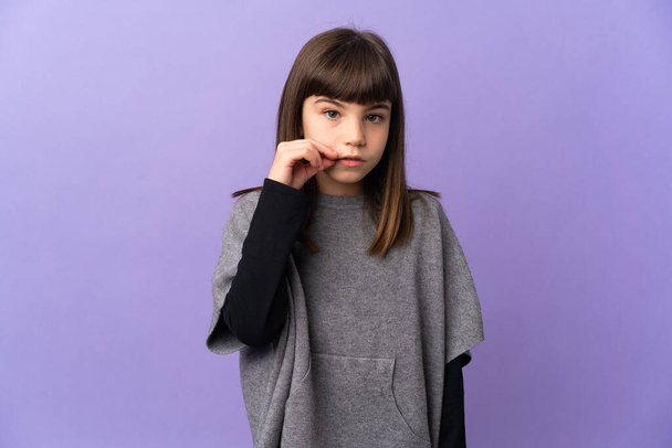 Little girl over isolated background showing a sign of silence gesture - Photo, Image