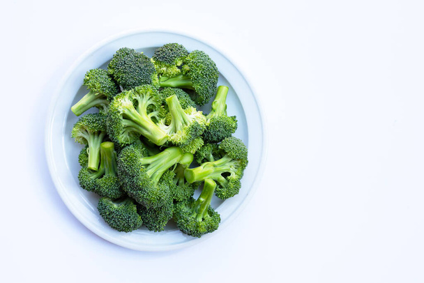 Fresh green broccoli on white background. - Фото, изображение