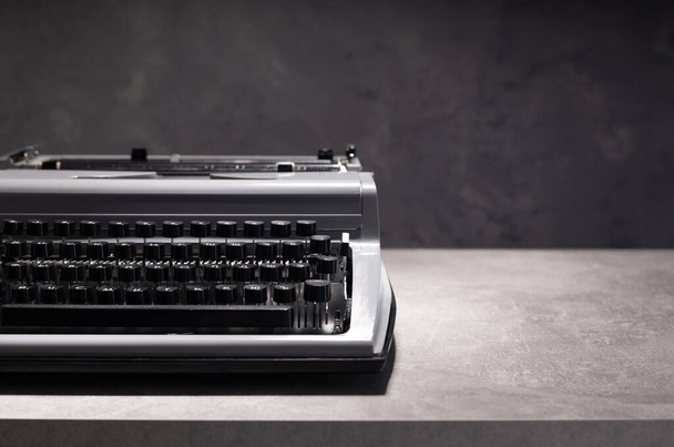 old retro typewriter at wooden table, creative writer concept - Photo, image