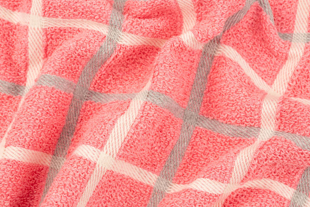 Textura de toalla rosa, gris y blanca como fondo. - Foto, Imagen