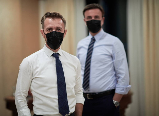 corporate business team wearing crona virus protection face mask keep social distance in luxury office - Photo, Image