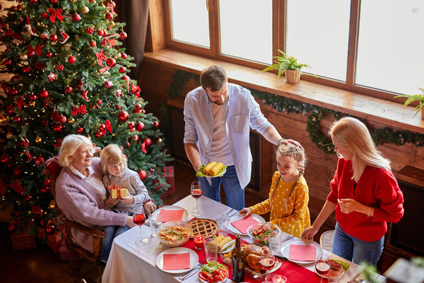 family enjoy together christmas lunch at home - Foto, imagen