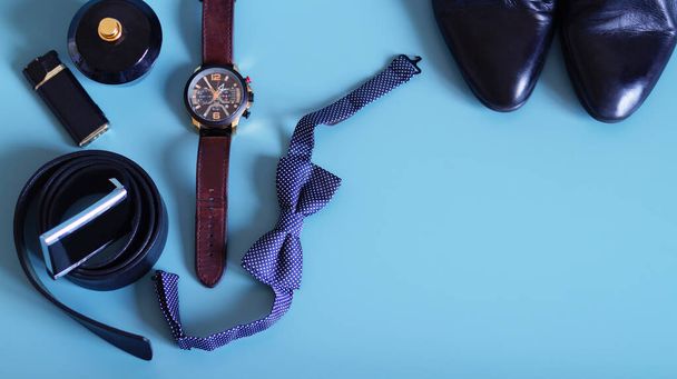 Man set. Father's day, shoes, perfume, belt, lighter, butterfly, watch on a bright background - Фото, зображення