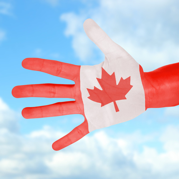 Flag of Canada painted on hand - Foto, Imagem