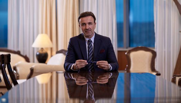 corporate businessman at luxury office pen holding  - Fotografie, Obrázek