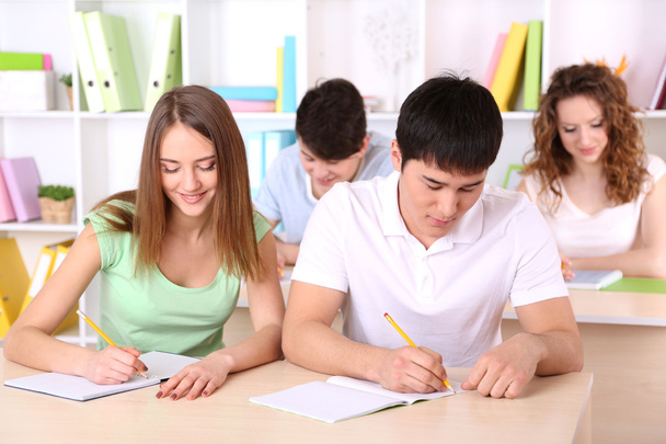 Group of young students sitting in class - Foto, Imagem