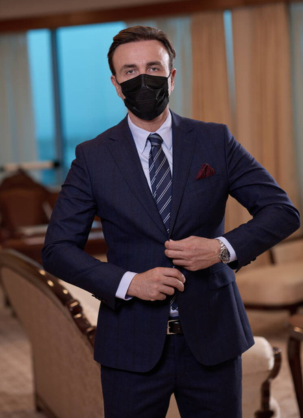 business man wearing protective face mask at office - Fotoğraf, Görsel
