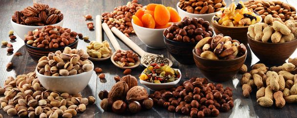 Composition with dried fruits and assorted nuts. Delicacies - Photo, Image