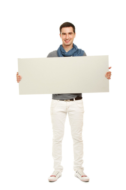 Young guy with a blank - Foto, Imagen