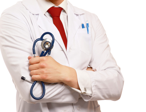 Male doctor holding stethoscope - Фото, изображение