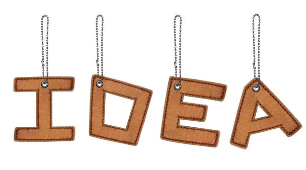 palabra idea hecha de alfabeto de cuero con cadena aislada
 - Foto, Imagen