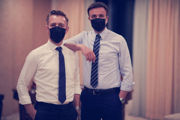 business team wearing crona virus protection face mask - Valokuva, kuva