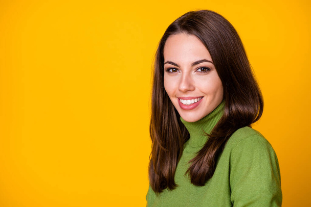 Close-up profile side view portrait of pretty content cheerful girl copy empty space isolated over bright yellow color background - Photo, image