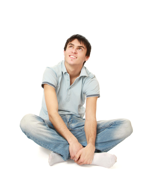 Pensive stylish young man sitting on floor - Foto, immagini