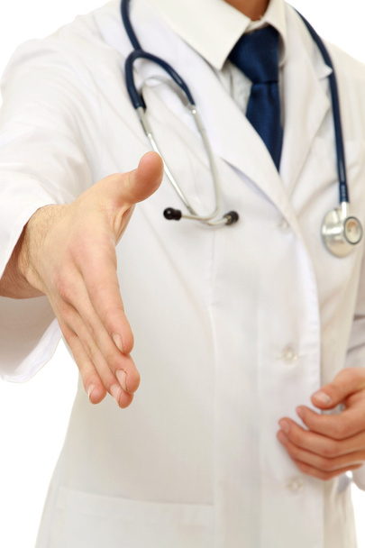 Doctor giving his hand for a handshake - Foto, imagen