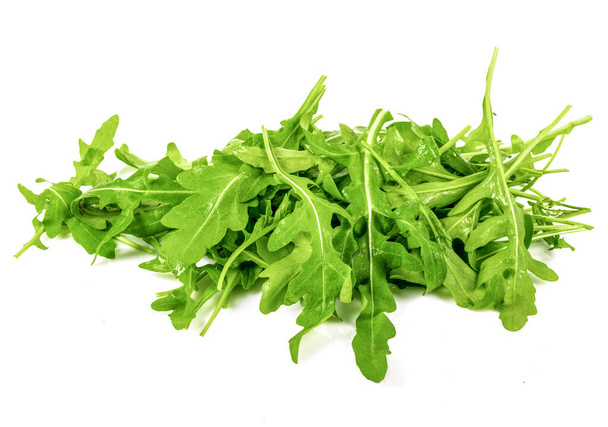 Heap of Green fresh rucola or arugula leaf isolated on white background. - Photo, Image