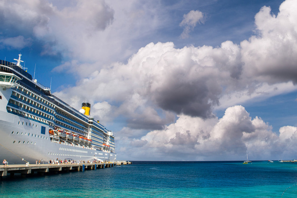 Cruise ship anchored in a caribbean port - Photo, Image