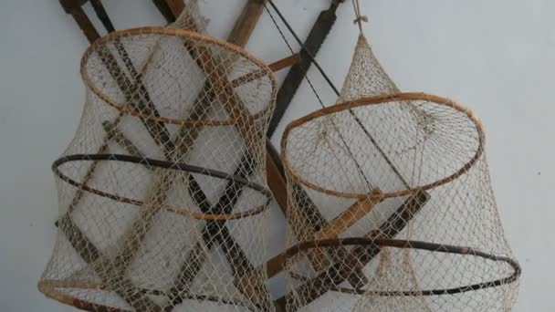 Fishing nets hang on the wall of the farmhouse - Footage, Video