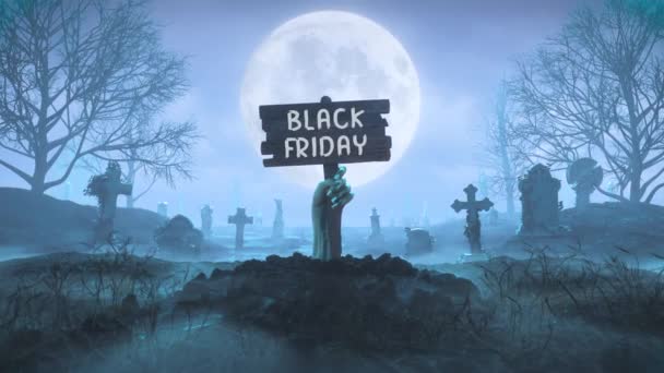 Zombie ręka z drewnianą tabliczką z Black Friday słowo z ziemi w nocy na tle księżyca na cmentarzu - Materiał filmowy, wideo