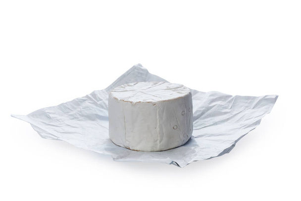 Camembert moldy cheese isolated on white background. Mixture of camembert brie and blue mold. - Fotó, kép