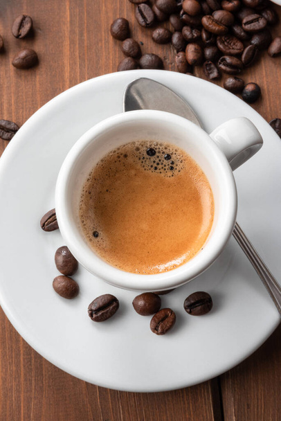 Cup of classic italian espresso on wooden table  - Photo, Image