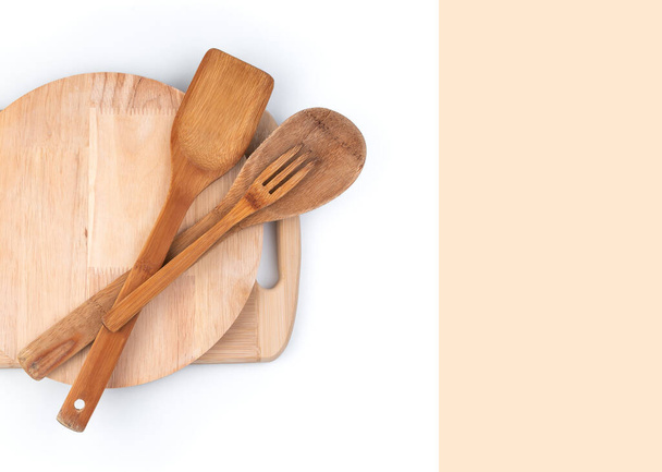Cutting boards and wooden spatulas on a white background with space to copy. - Photo, Image